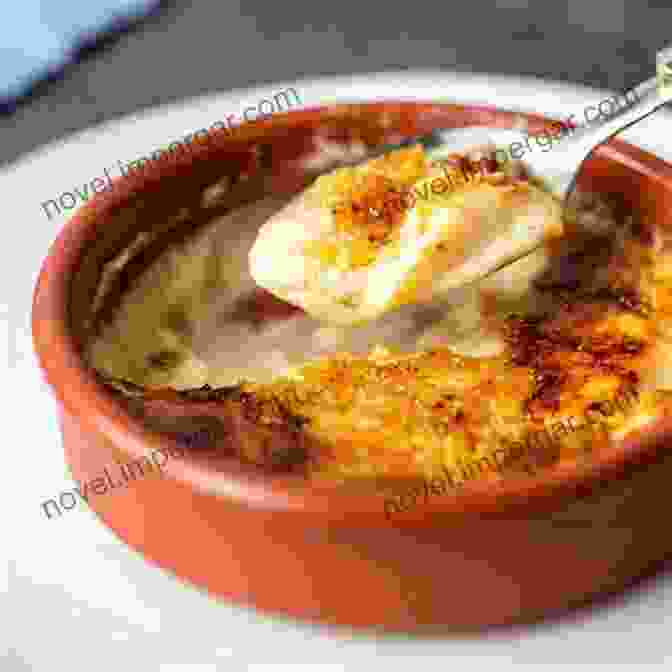 Crema Catalana, A Custard Dessert With A Caramelized Sugar Topping, Served In A Ceramic Dish Famous Classic Spanish Desserts With Jane Eyre: Explore Delectable Traditional Sweets From Spain